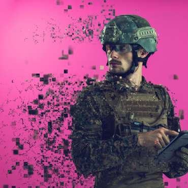 soldier using tablet computer closeup pixelated